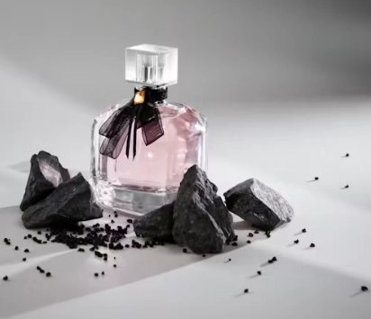a bottle of pink perfume