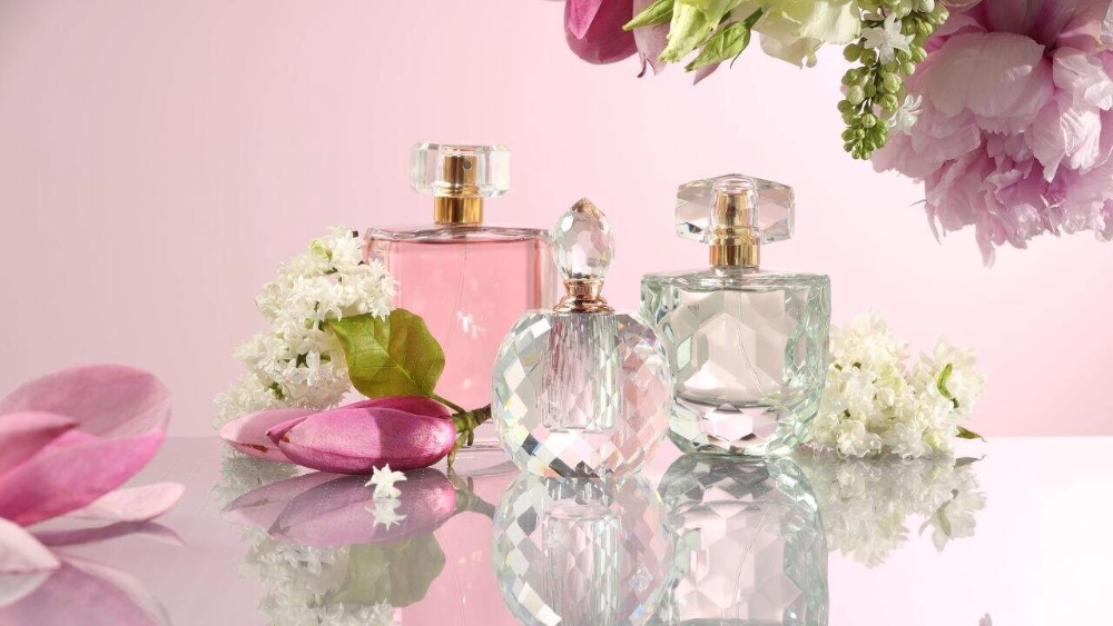 perfume against a floral background