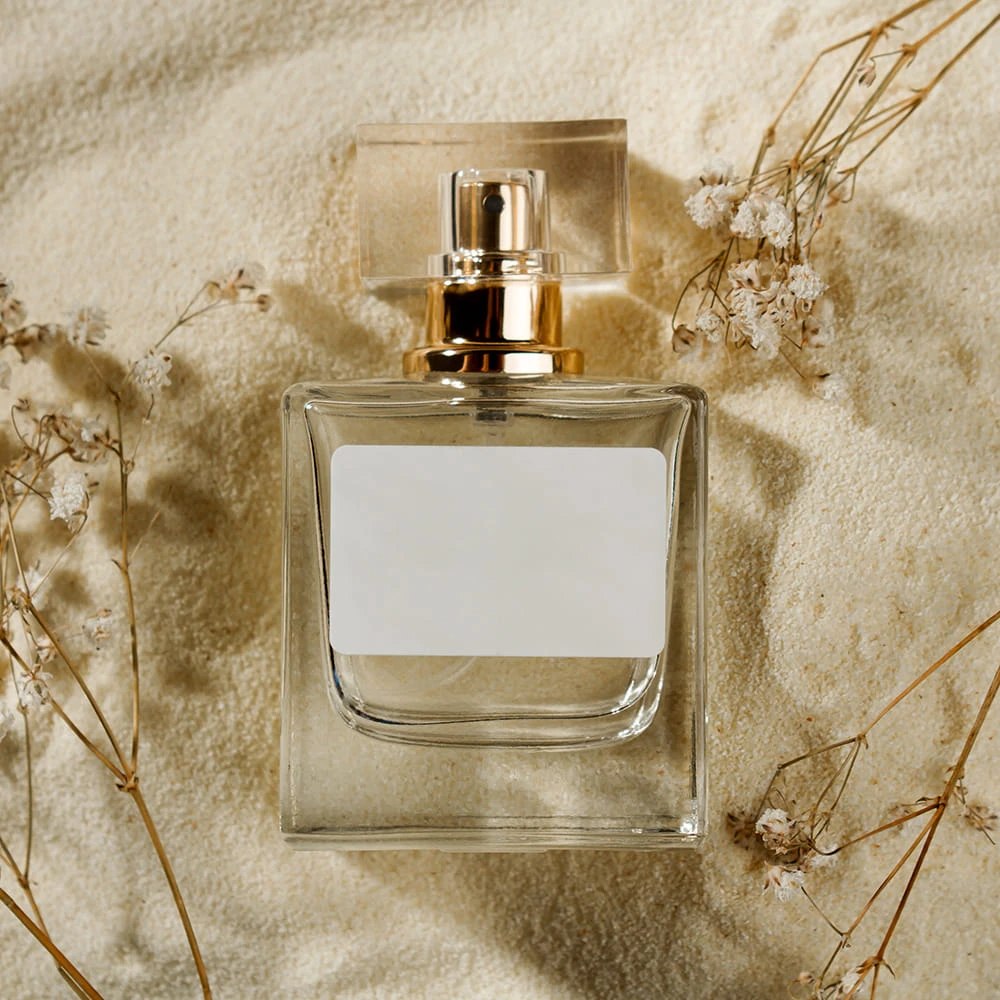 a bottle of transparent perfume