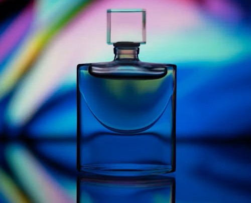 fragrance against a background of colored light